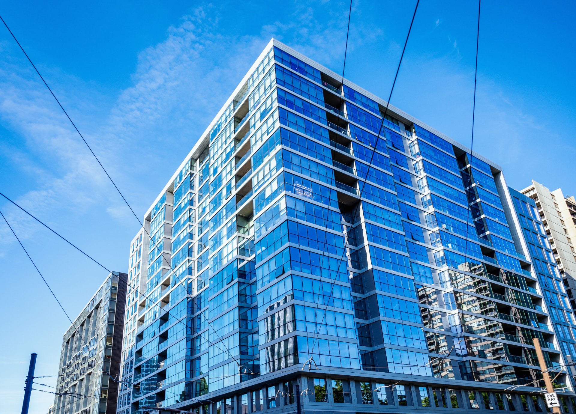 Commercial building glass facade treated with 3M solar control window film in Tampa