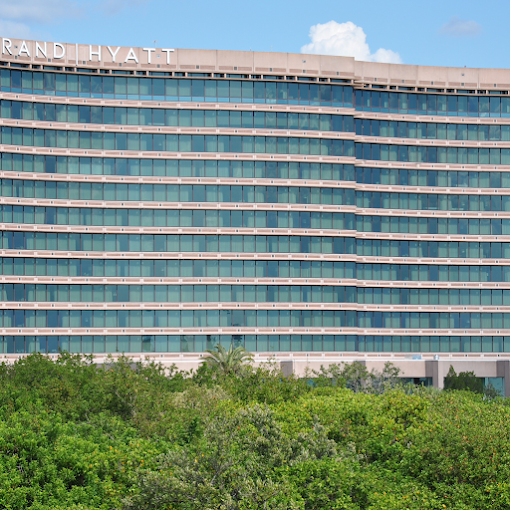 Beachfront hotel tower with solar control window film on guest room glass