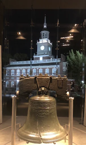 Historic government building illuminated at night with protected glazing